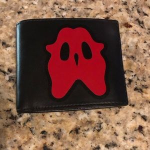 Burberry ghost face wallet. Purchased in Lisbon, fell in some cleaner.